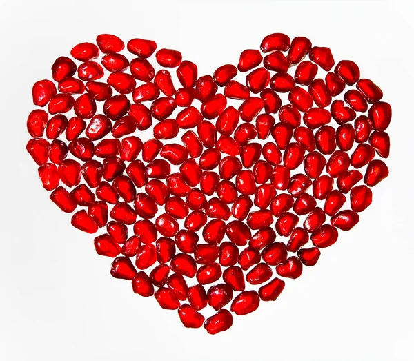 Bir kalp şeklinde bir nar taneleri.