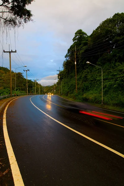 The car is moving quickly on the road. — Stock Photo, Image