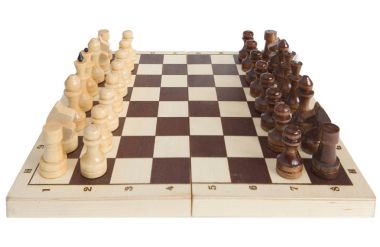 Satranç taşları bir satranç tahtası üzerinde yerleştirilir.
