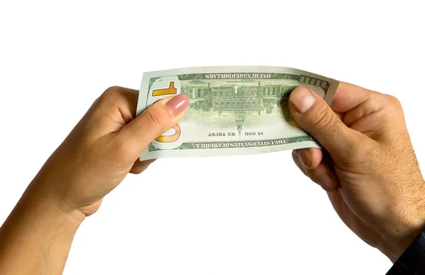 Bir erkek ve bir kadının el 100 dolar tutun. — Stok fotoğraf