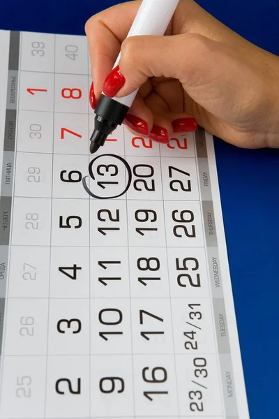 Date Friday 13 is marked on the calendar. — Stock Photo, Image