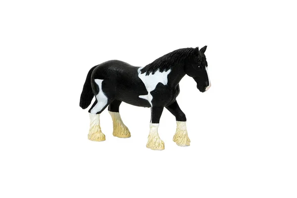 Pferdespielzeug auf weißem Hintergrund — Stockfoto