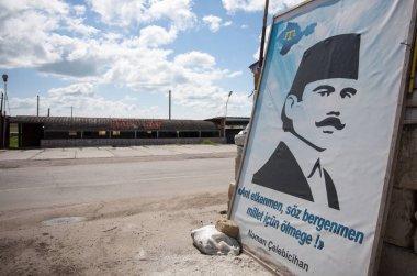 CHONHAR, UKRAINE 21 JULY, 2016: Crimean Tatar poster near the Ukraine's Crimea border clipart
