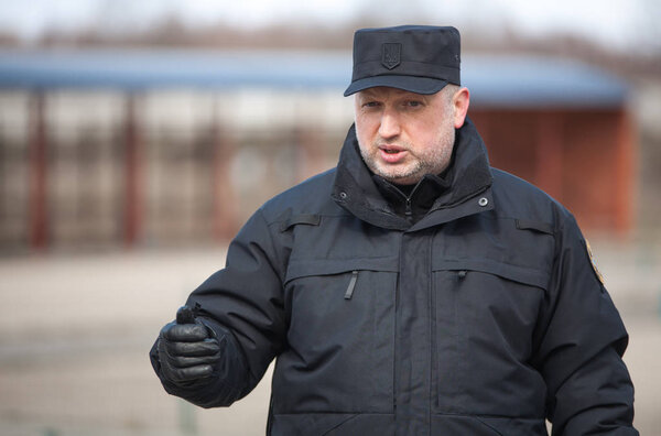 КИЕВ, УКРАИНА МАРТ 18, 2016: Секретарь СНБО Александр Турчинов на базе Национальной гвардии
