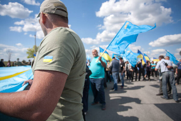 CHONHAR, UKRAINE AUGUST 20, 2016: Crimean Tatars people gathered rally near Crimean border