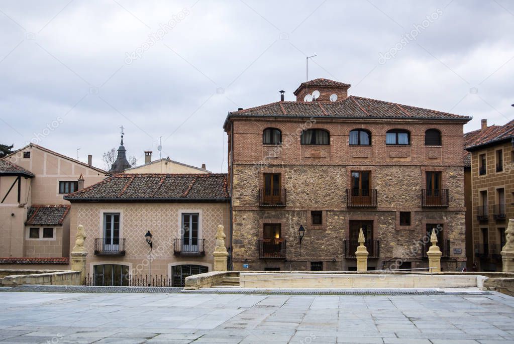 A medieval square with old decorated houses at the historical center of Segovia, Castille and Leon, Spain.