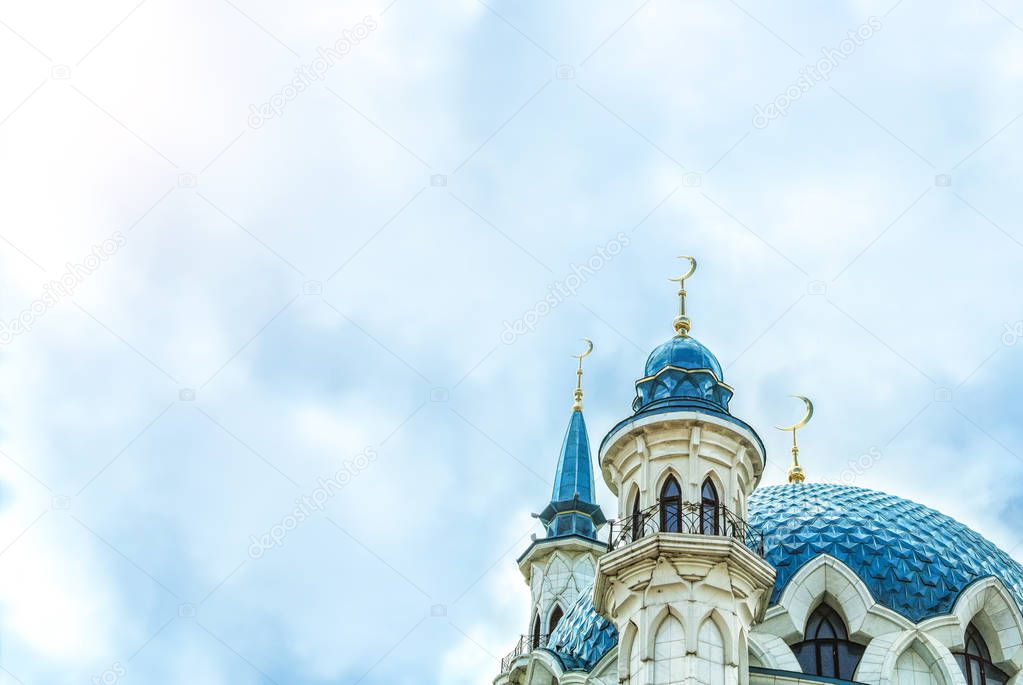 A background with copy space, cloudy sky and Kul Sharif Mosque, one of the largest mosques in Russia.