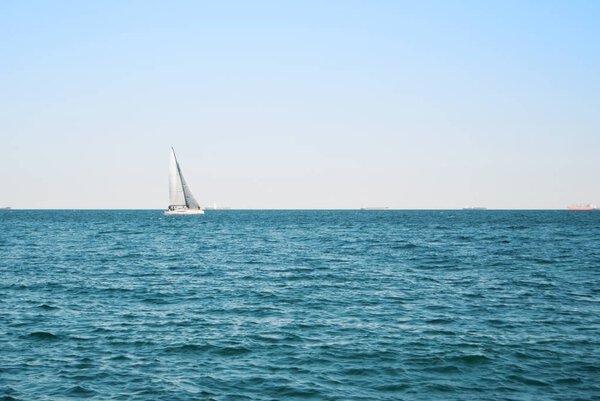 Sea lake ocean water landscape with dark waves and a lonely whit