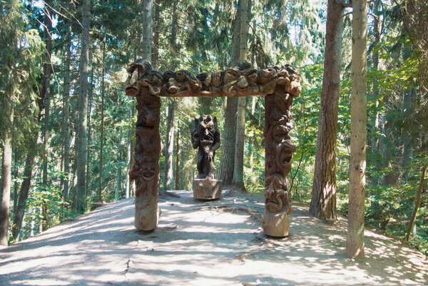JUODKRANTE, LITHUANIA - JULY 16, 2015: Old wooden decorated scul