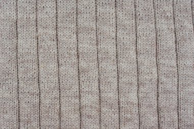 Arka plan bej dokulu draperies. Örgü desen