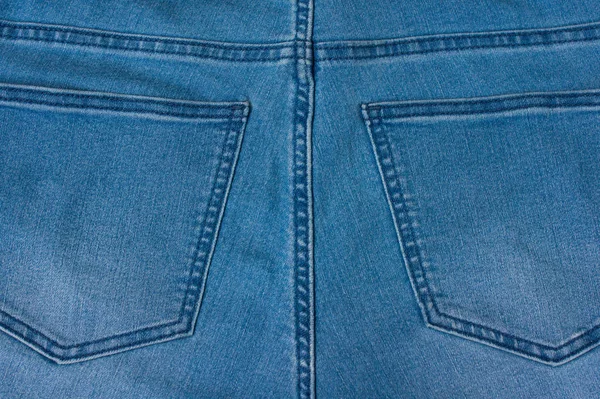 Jeans achtergrond van blauwe denim textiel — Stockfoto