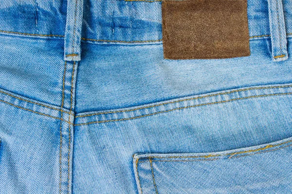 Jeans fondo di tessuto denim blu — Foto Stock