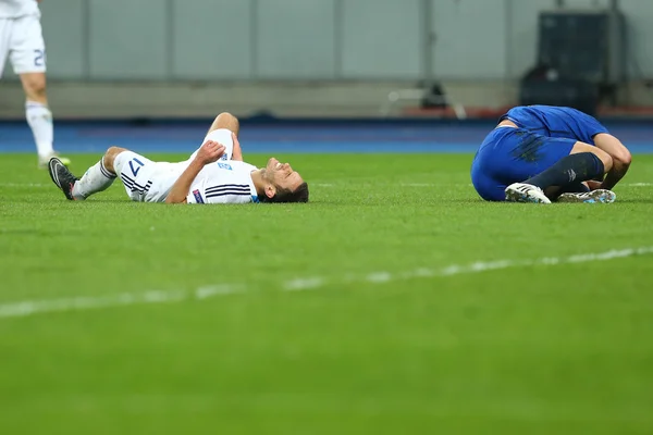 Serhiy Rybalka lies ath the ground injured, UEFA Europa League Round of 16 second leg match between Dynamo and Everton — Stock Photo, Image