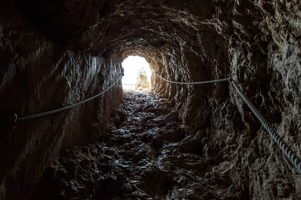 Rock tunnel in the mountains - Natural Park of Penyal d'Ifac