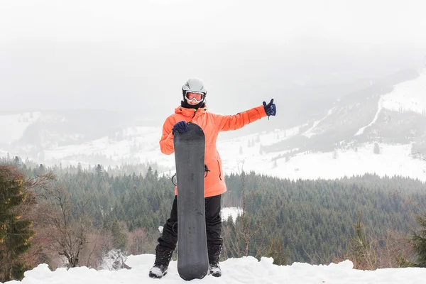 Chica con un snowboard —  Fotos de Stock