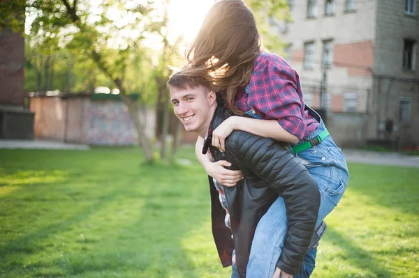 Happy, emotional young couple are walking outside. — Stock Photo, Image