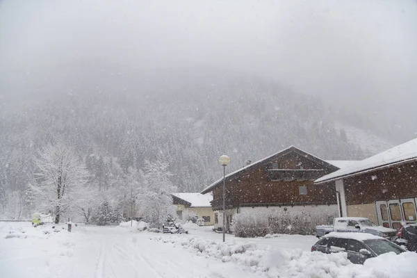 Snowfall in a mountain city in Italy. Trentino region — Stock Photo, Image
