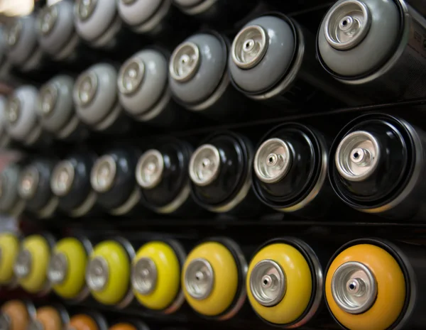 Latas não utilizadas de tinta spray — Fotografia de Stock