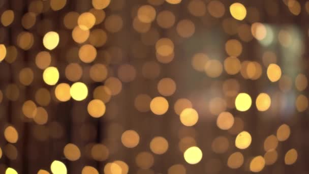 Lumière abstraite. Des lumières de Noël floues. fond bokeh. Vidéo de stock 