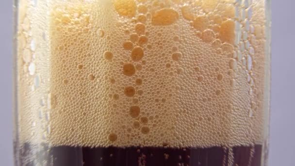 Cola bubbles in a glass close up — Stock Video