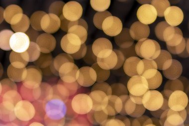 Bokeh odaklı ışıklarla şenlikli soyut arkaplan