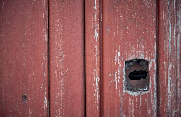 Wooden door with a keyhole. Texture. — Stock Photo, Image