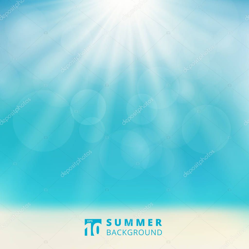 Summer season seascape with sky sunlight bokeh on the beach blur