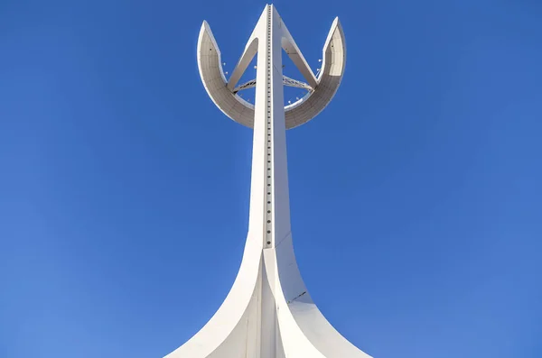 BARCELONA,SPAIN-FEBRUARY 6,2013: Communications tower or tower Telefonica, designed by Santiago Calatrava, olympic area, park montjuic, Barcelona. Royalty Free Stock Images