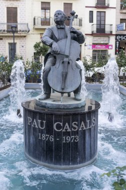 Sculpture tribute to Pau Casals, artist born in El Vendrell, statue by Josep Viladomat, El Vendrell, Costa Daurada, province Tarragona,Catalonia. clipart
