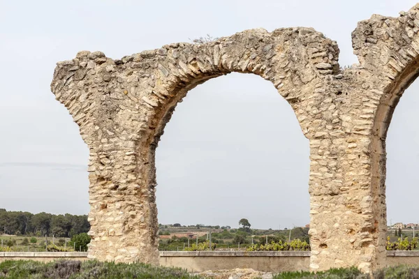SANT JAUME DELS DOMENYS, SPAIN-APRIL 18,2015: Ancient arches ruins, Roman aqueduct, Sant Jaume dels Domenys, Catalonia.