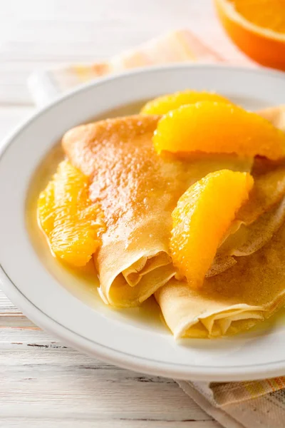 Crepe suzette, traditional french dessert with thin pancakes and orange sauce. — Stock Photo, Image
