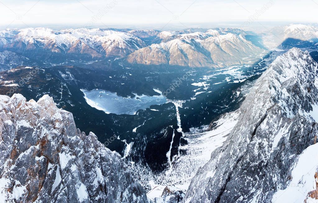 Aerial view of a frozen mountain lake