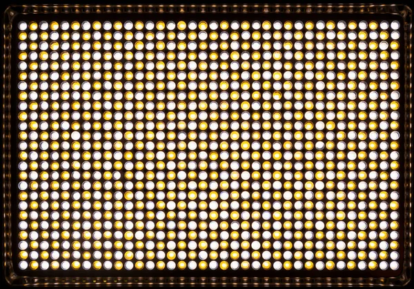 Led flood light with blinds for video and photography. 900 white and yellow diodes to create light with variable color temperature Kelvin 3200-5500. Powered by battery and power adapter