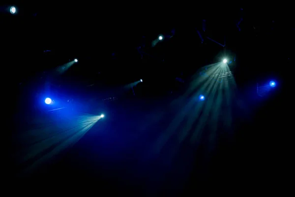 The light of searchlights in smoke on stage of the theatre — Stock Photo, Image