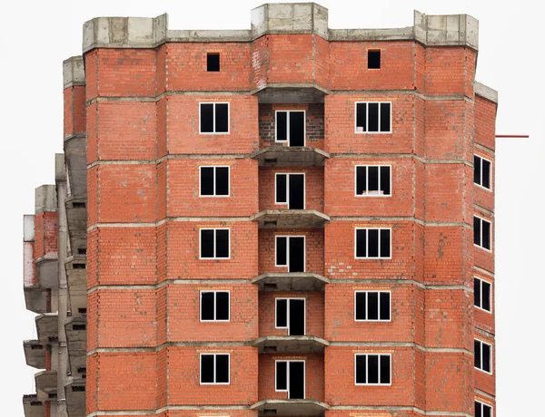 The construction of multi-storey houses of red brick — Stock Photo, Image