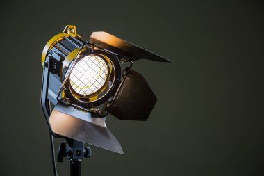 Halogen spotlight with a Fresnel lens. TV, video, photo, shooting clipart