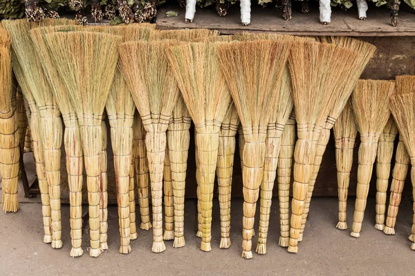 Brooms sold on the market — Stock Photo, Image