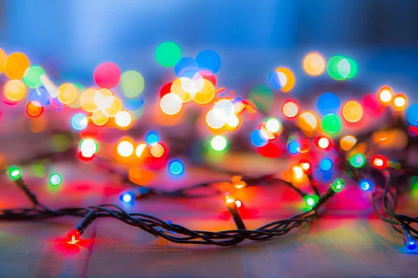 Renkli ışıklar Noel çelenk. Renkli arka plan