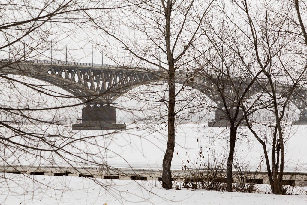 Winter cityscape. Bridge across the Volga river between the cities of Saratov and Engels, Russia