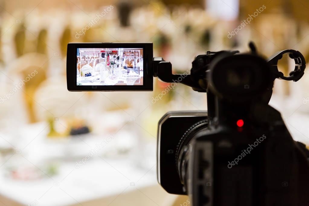 Filming of the event. Videography. Served tables in the Banquet hall.