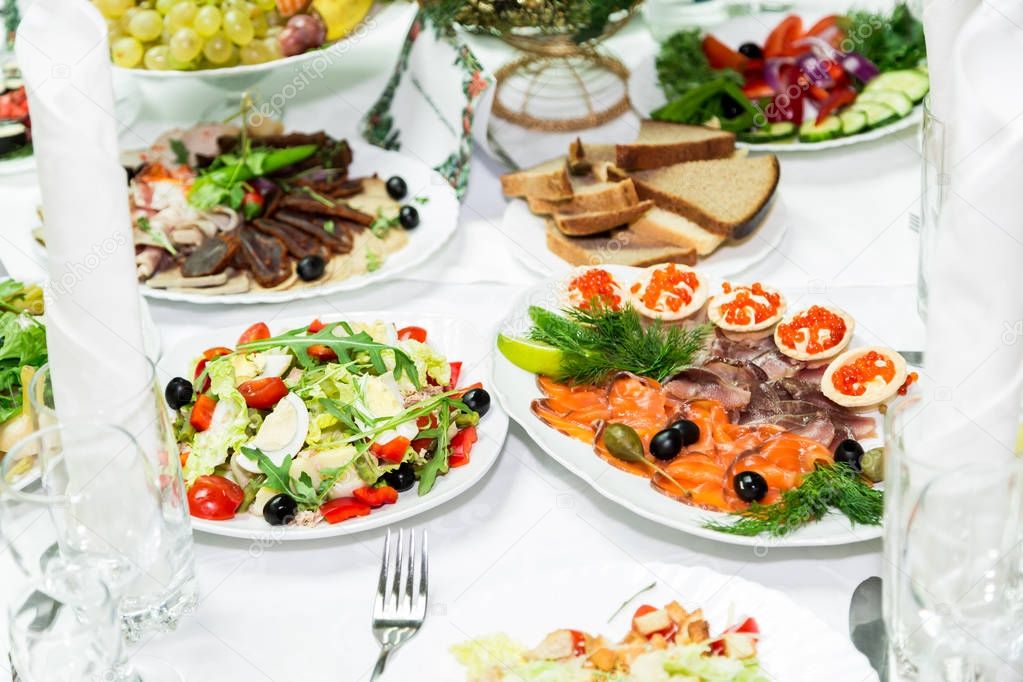 Snacks and delicacies at the Banquet table. Catering. Celebration or wedding. Buffet.