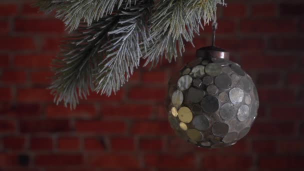 Mirror Christmas ball on the brick wall background. — Stock Video