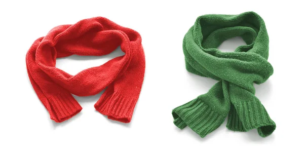 Red and green warm scarves on a white background. — Stock Photo, Image