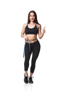 Atletik fitness kadın metre helthy izole spor beyaz arka plan siyah giysiler ile