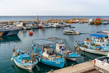 CYPRUS, PROTARAS - MAY 11/2018: Fishermen moored their boats at the pier in the village.