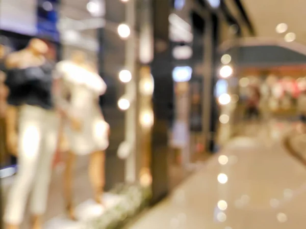 Blurred mannequins in a clothing shop — Stock Photo, Image