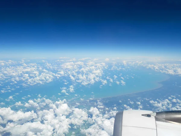 Aerial view of blue ocean and clouds