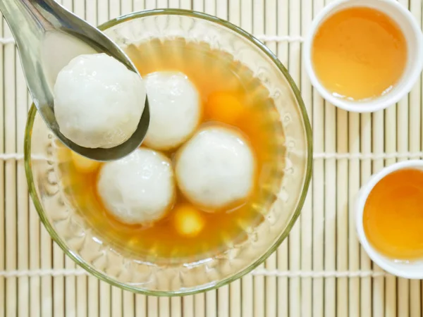 Sweet glutinous rice balls filled with black sesame seeds