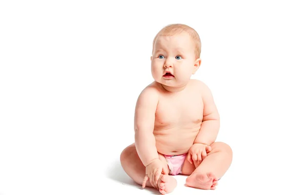 Bebê sentado no fundo branco — Fotografia de Stock