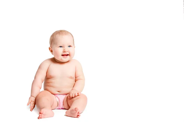 하얀 배경에 앉아 있는 아기 — 스톡 사진